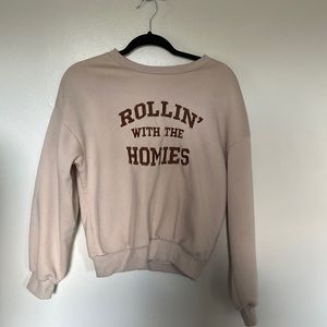 Creme colored with brown lettering.